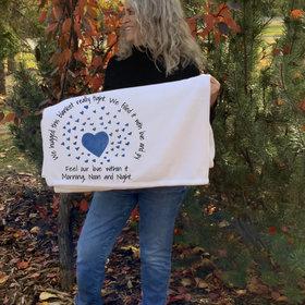Give the gift of a hug on a cozy personalized throw blanket this year!  Cozy, soft and personal.